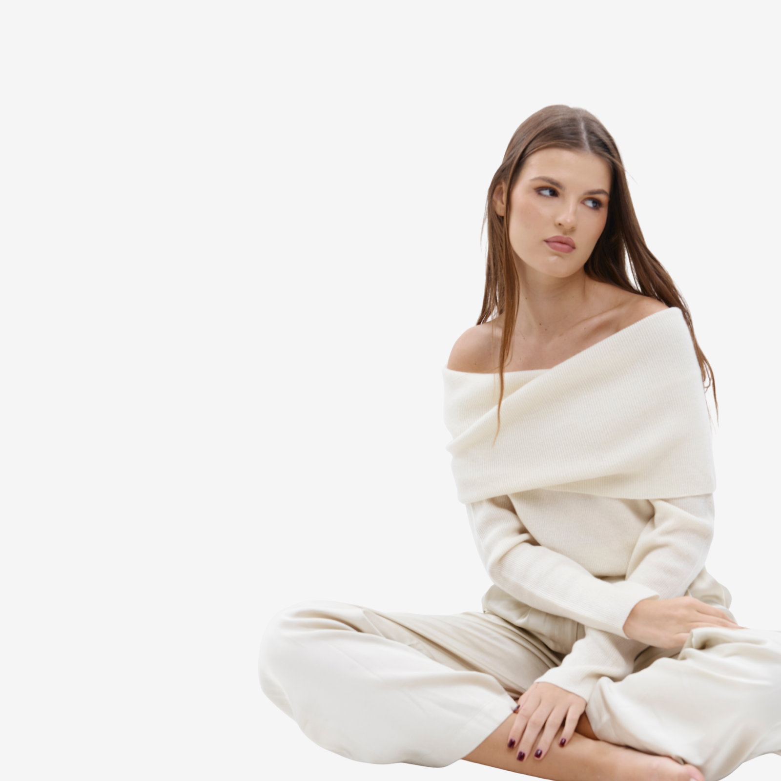 woman wearing a white pure cashmere, off-shoulder sweater by Silk & tonic fashion brand