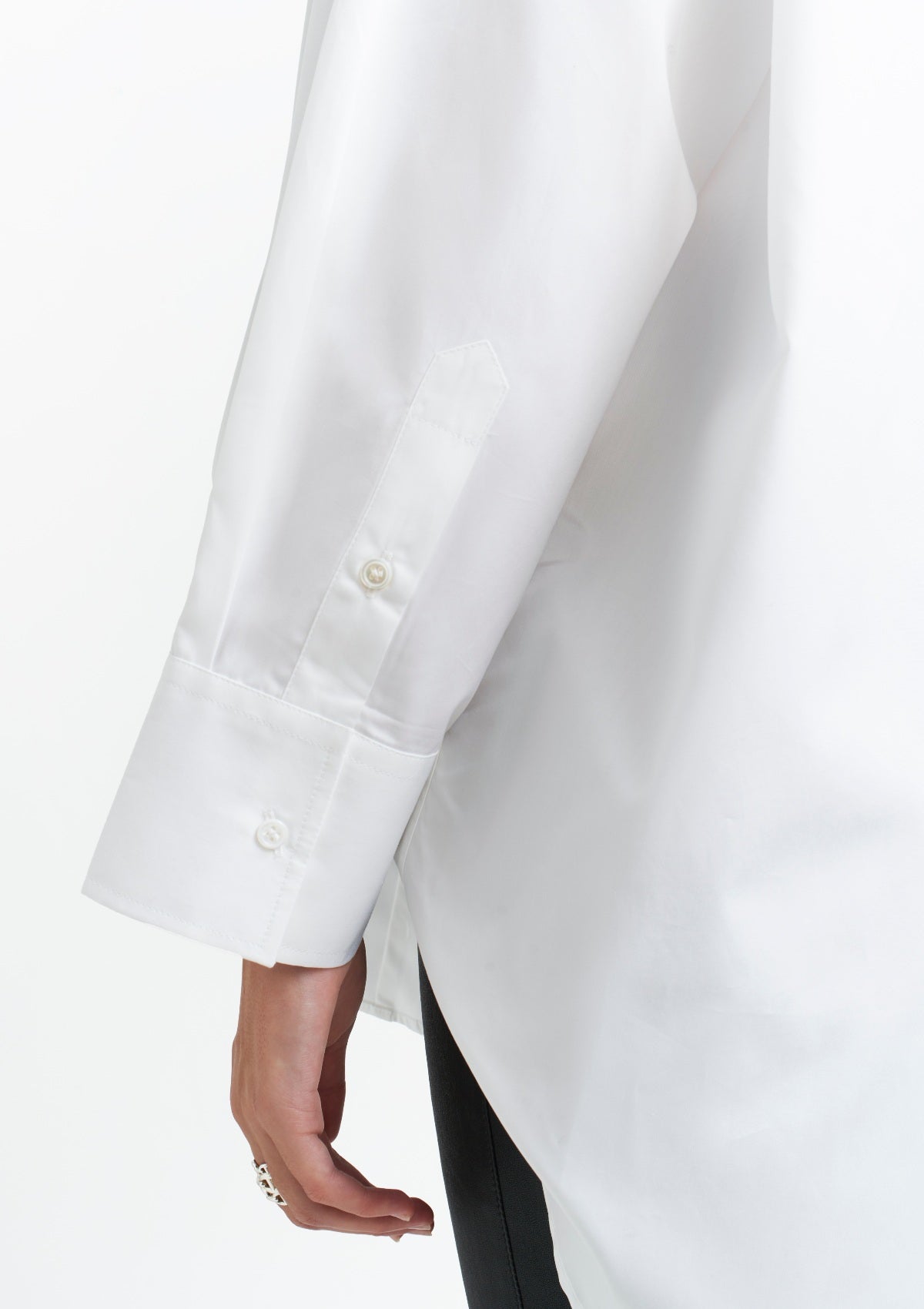 A crisp white, timeless, oversized women's shirt by Silk & tonic luxury fashion brand