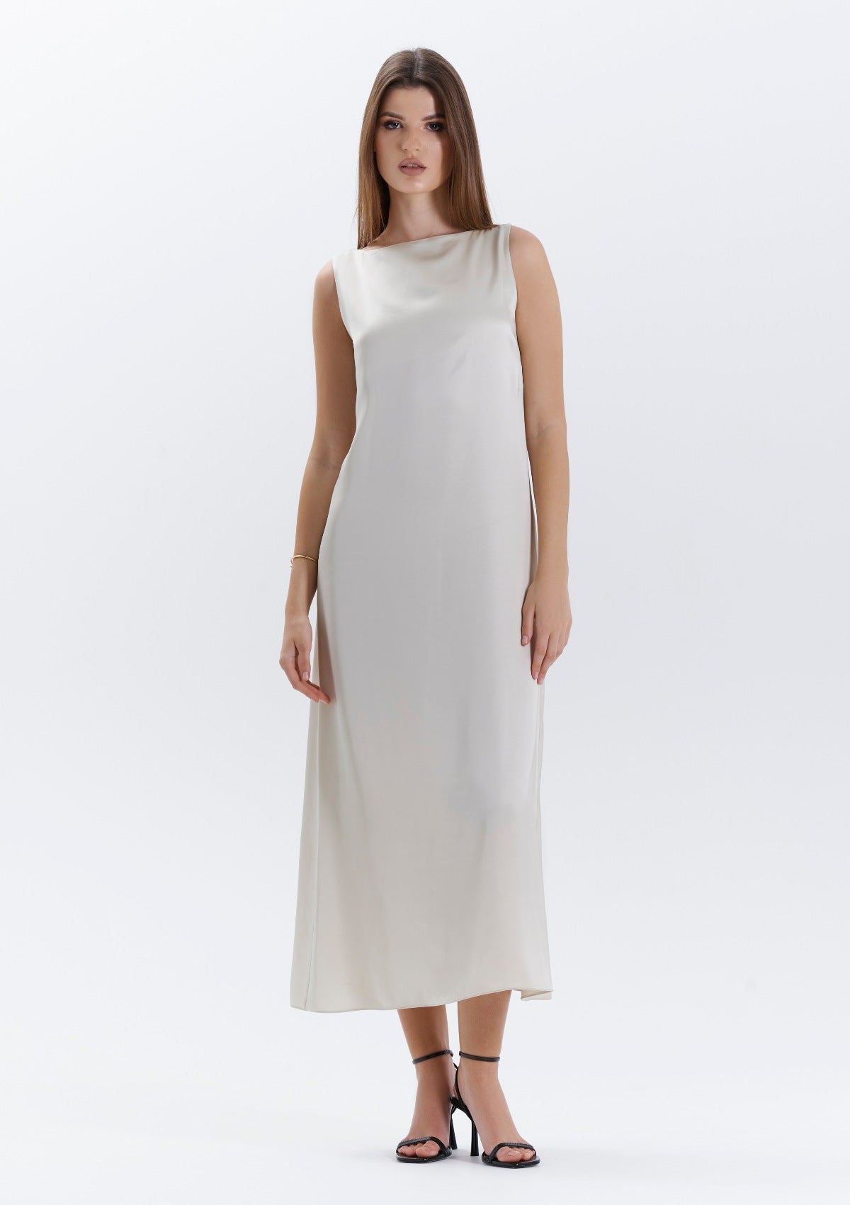 An elegant beige midi slip dress.