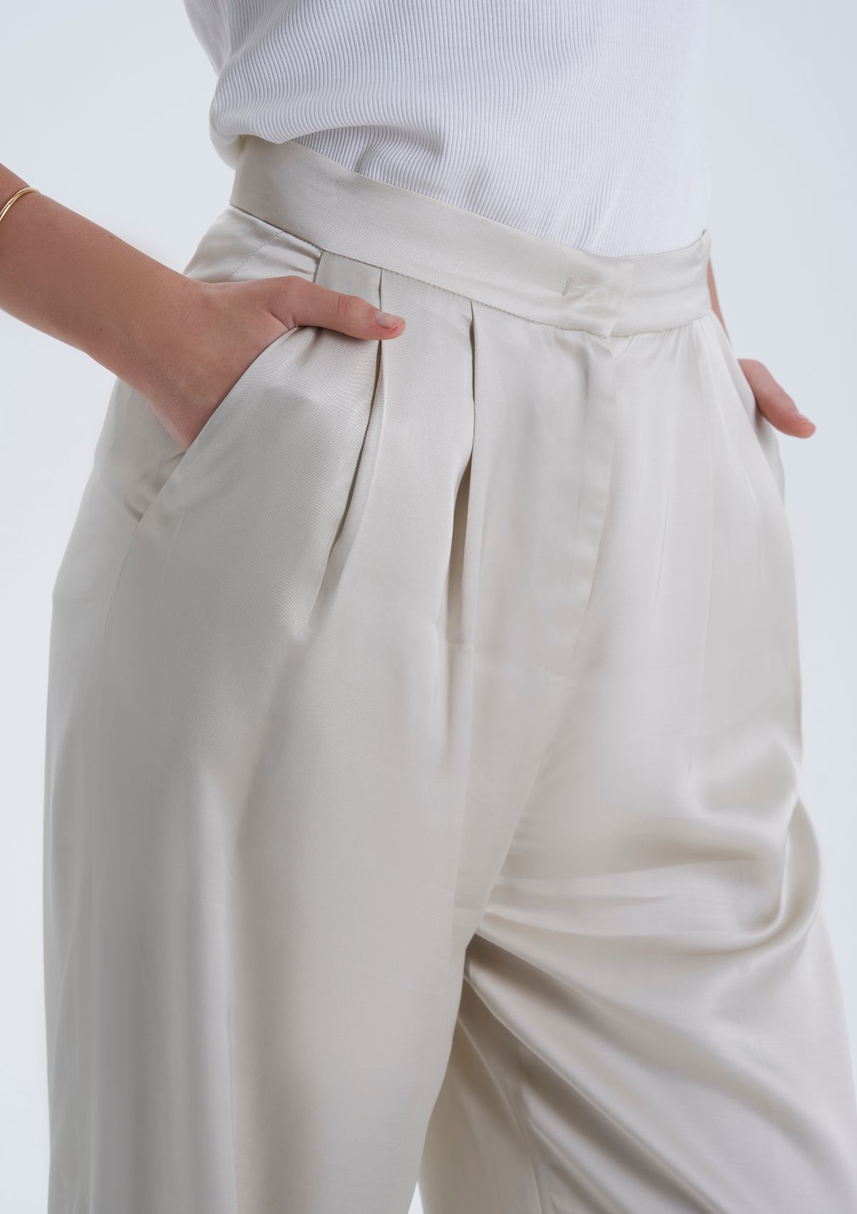 pleated, loose fit trousers for women in satin fabric by Silk & tonic luxury fashion brand