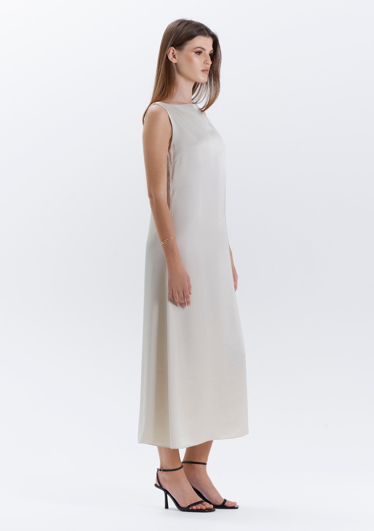 A sand shade slip midi dress by Silk & tonic.