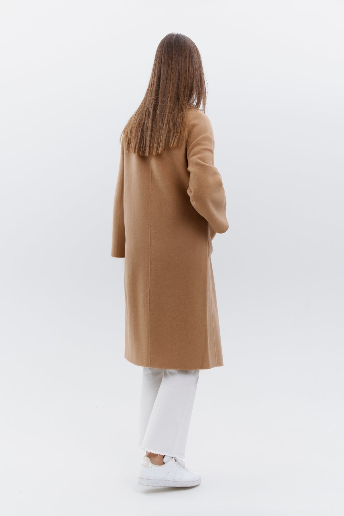 a double-faced cashmere coat in versatile camel hue