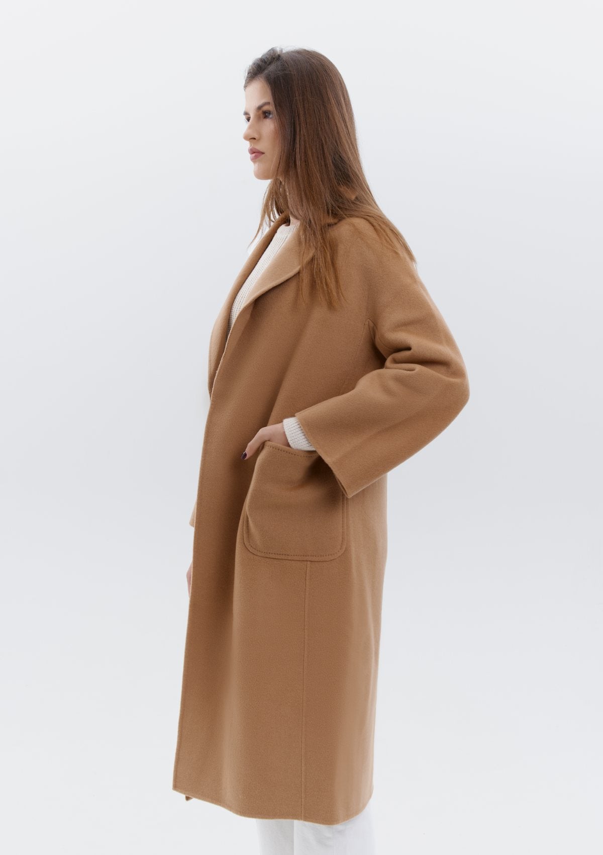 a double-faced superior quality cashmere coat with side pockets