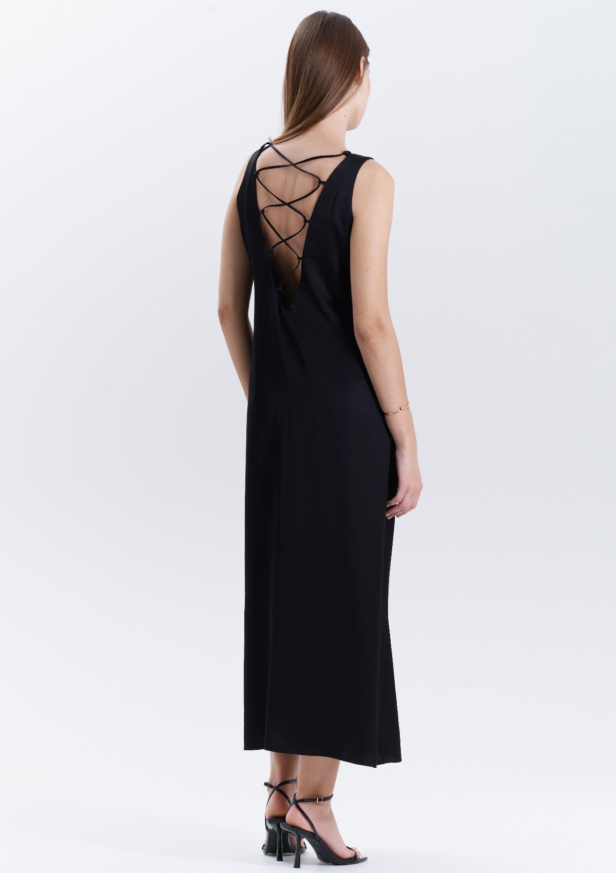 stunning-low-back-black-dress-by Silk & tonic fashion brand